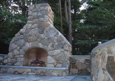 feild stone outdoor fireplace